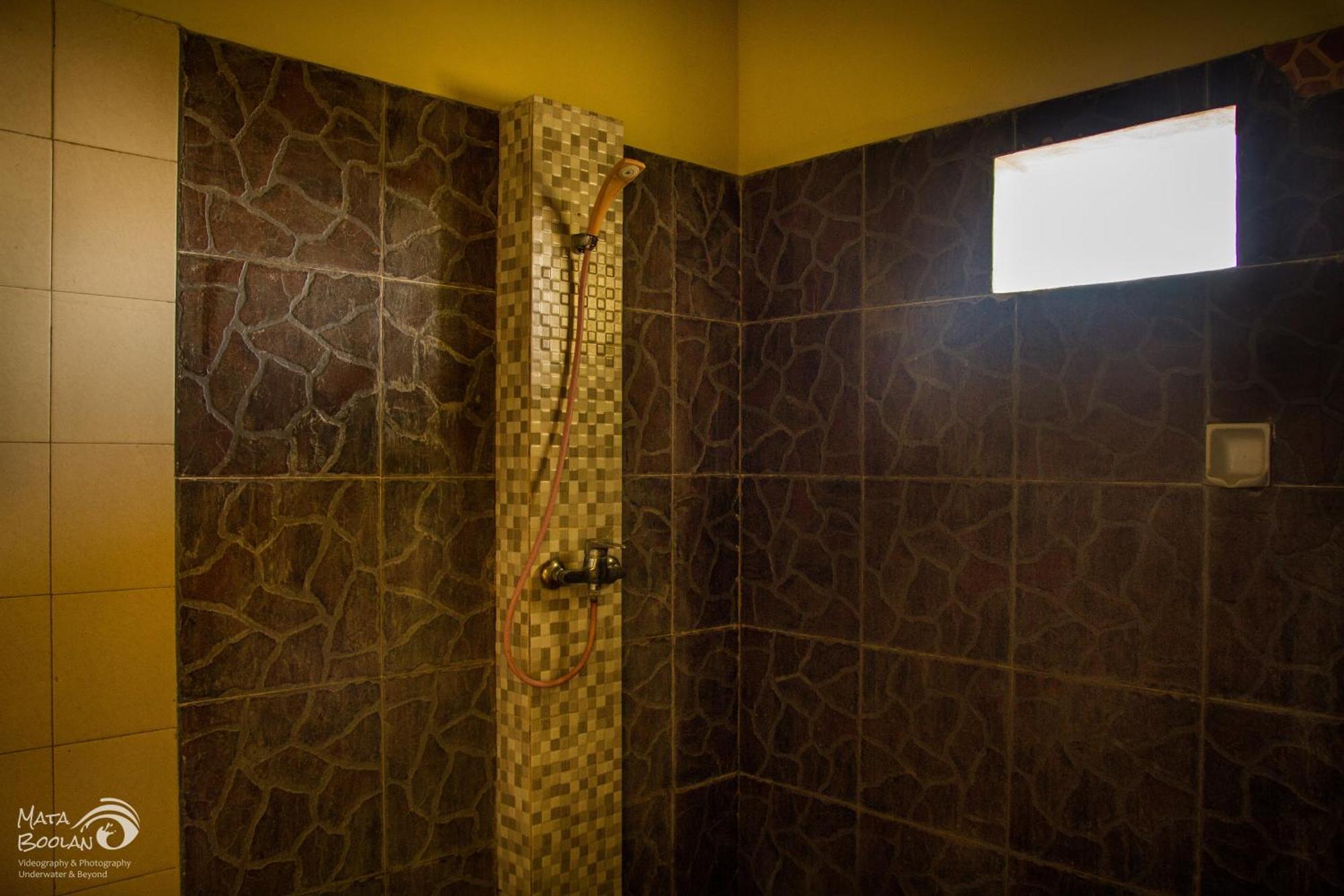 Beten Waru Bungalow And Restaurant Amed Quarto foto